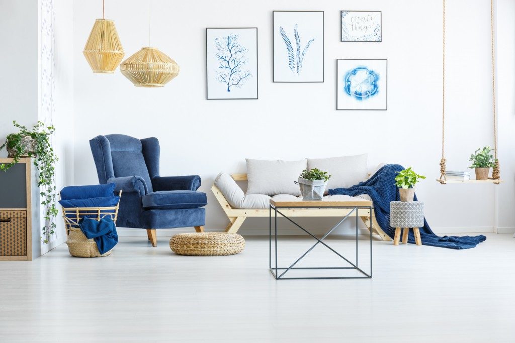Living room with navy blue chairs