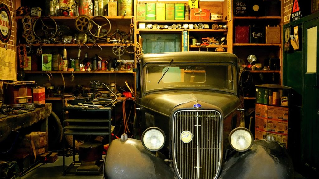 an old car in a garage