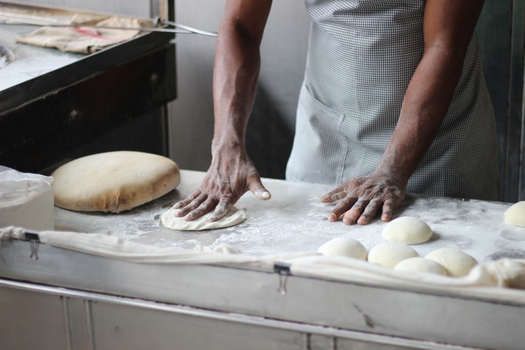 man making bread