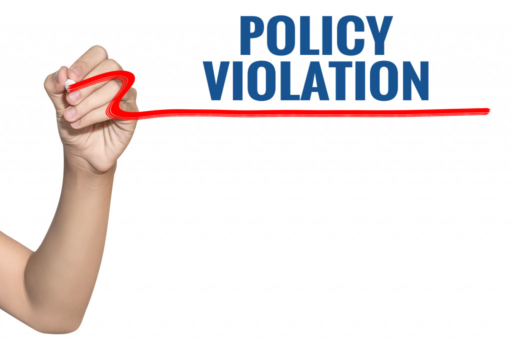 policy violation word underlined in red